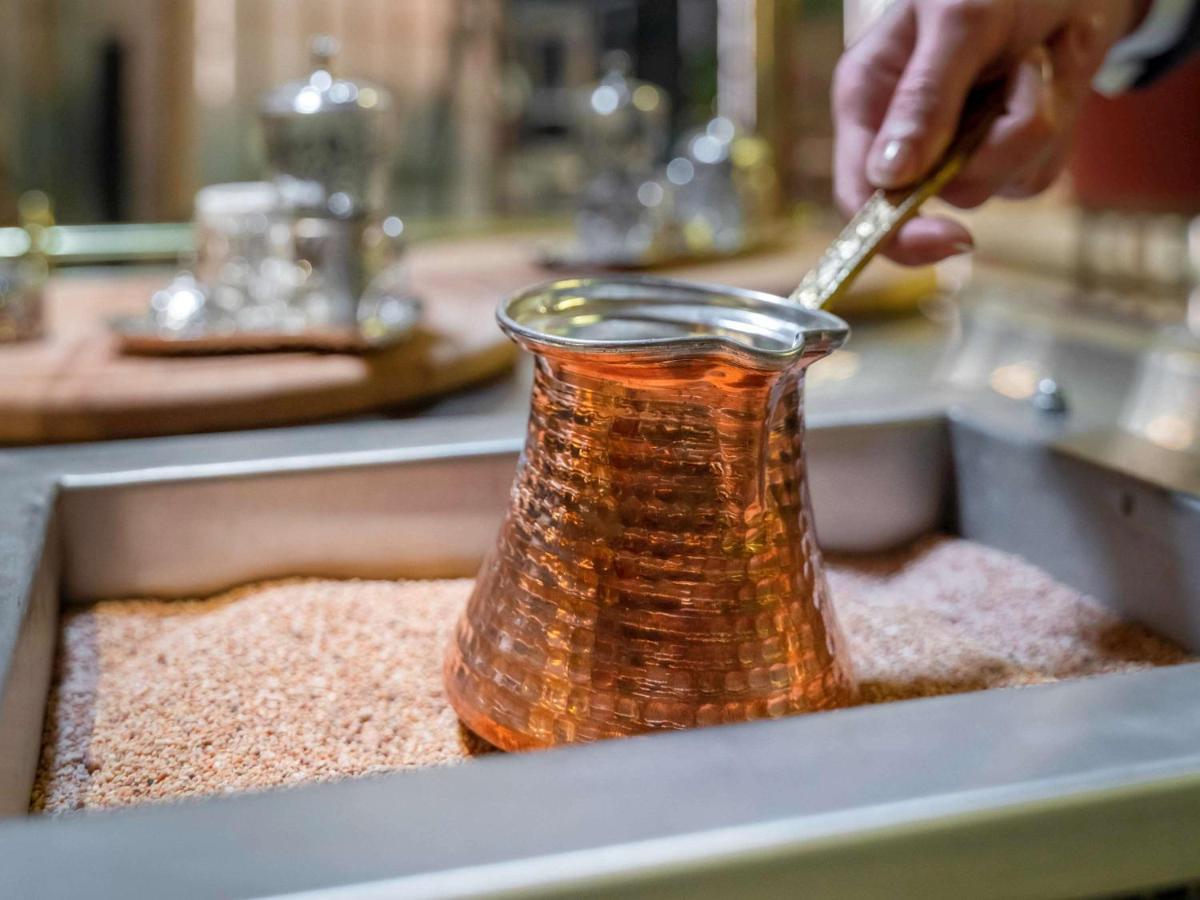 Mercure Trabzon Hotel ภายนอก รูปภาพ Turkish coffee being prepared in a cezve